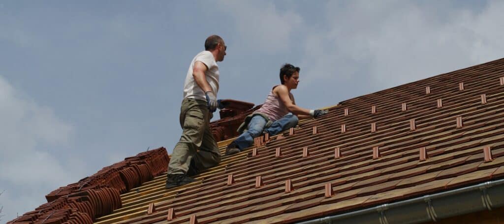 female roofer in training