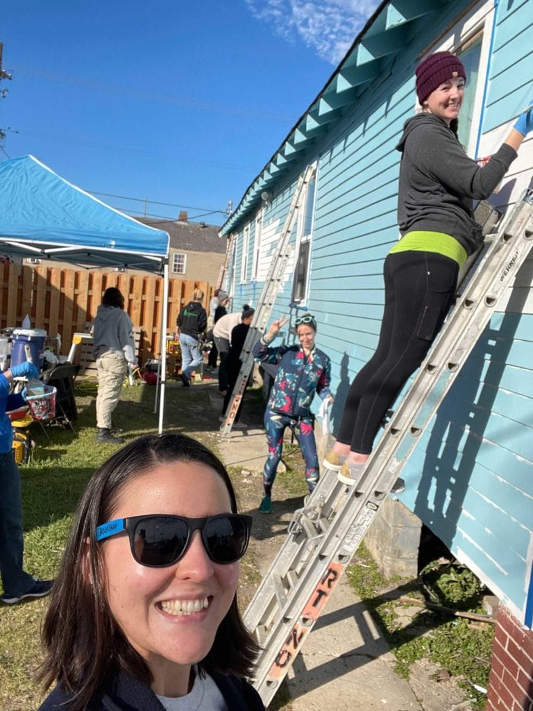 RoofSnap team painting siding